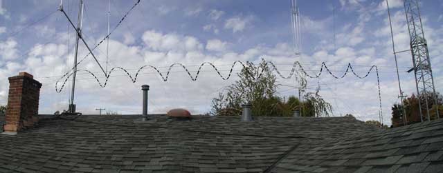 Ladder-line suspended over roofTop section