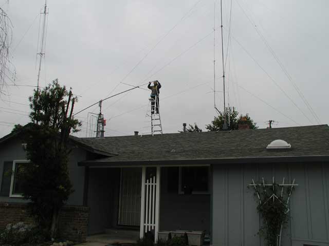 On ladder on roof adjusting elements