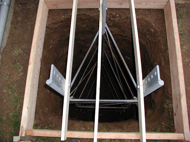 Tower base correctly mounted in hole