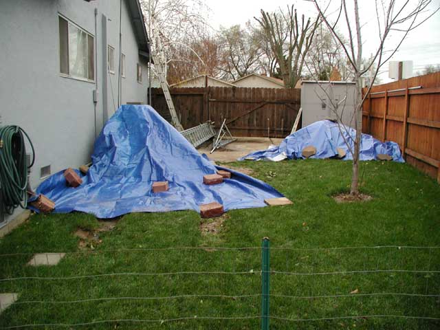 Tarp covering hole from rain