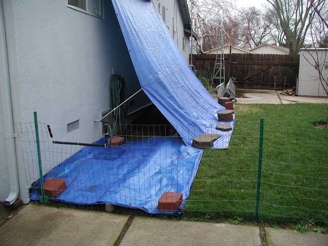 Tarps covering the work area